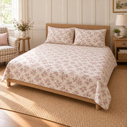 Weigela Ditsy Garden Sprigs quilt set, pulled-back front-right view, AI-generated mockup