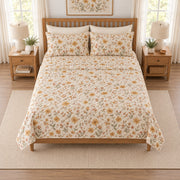 Golden ochre cottage daisy quilt set elevated overhead view