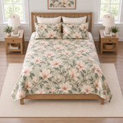 Blush magnolia misty sage quilt set elevated overhead view