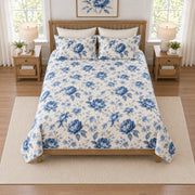 Indigo watercolor peony quilt set elevated overhead view