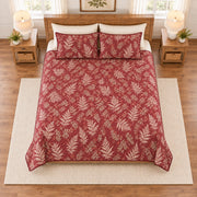 Dusty cranberry fern frond quilt set overhead view