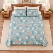 Muted aqua sand dollar and coral quilt set overhead view