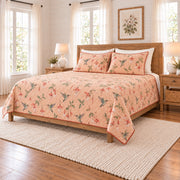 Soft peach hummingbird and fuchsia quilt set right angle