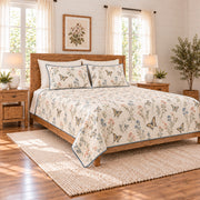 Warm ivory swallowtail butterfly and wildflower meadow quilt set left angle