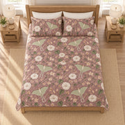 Dusty mauve luna moth moonflower quilt set overhead view