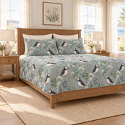 Muted coastal teal Atlantic puffin and sea campion quilt set left angle