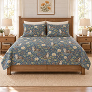 Dusty denim river otter and water lily quilt set, front hero view