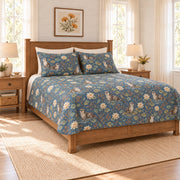 Dusty denim river otter and water lily quilt set, left angle view