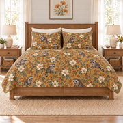 Warm ochre raccoon and magnolia quilt set front view