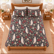 Soft charcoal penguin and winterberry quilt set overhead view