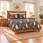 Soft charcoal penguin and winterberry quilt set left angle