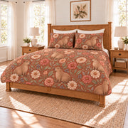 Warm terracotta capybara and zinnia quilt set right angle