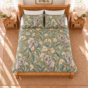 Muted sage koala and eucalyptus blossom quilt set overhead view