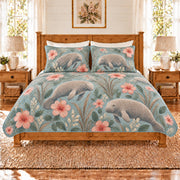 Dusty aqua manatee and hibiscus quilt set front view