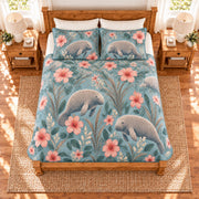 Dusty aqua manatee and hibiscus quilt set overhead view