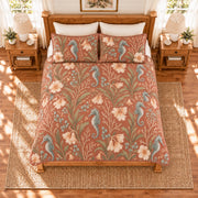 Muted clay seahorse and coral bells quilt set overhead view