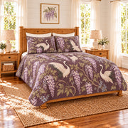 Muted plum crane and wisteria quilt set, left angle