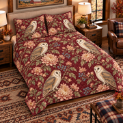 Muted burgundy barn owl and chrysanthemum quilt set, left angle hero view