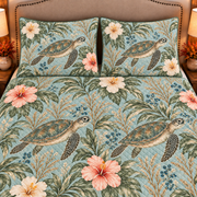 Muted seafoam green sea turtle and hibiscus quilt set, closeup view