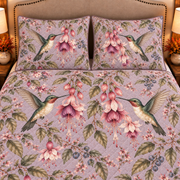 Dusty lavender hummingbird and fuchsia quilt set, closeup view