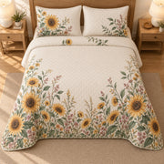AI mockup, high overhead bedroom view of a sunflower quilt with sunflower meadow clusters on cream and two matching printed pillow covers.