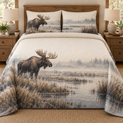 AI mockup, front bedroom view of a moose quilt with moose beside a misty marsh and two matching printed pillow covers.