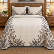 AI mockup, front bedroom view of a moose quilt with palmate moose antlers and botanical border and two matching printed pillow covers.