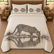 AI mockup, high overhead bedroom view of a leopard quilt with drinking leopard and its waterhole reflection and two matching printed pillow covers.