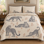 AI mockup, front bedroom view of a leopard quilt with five leopard poses in a line-art wildlife study and two matching printed pillow covers.