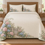 AI mockup, front bedroom view of a hydrangea quilt with wooden garden gate surrounded by hydrangeas and two matching printed pillow covers.