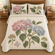 AI mockup, high overhead bedroom view of a hydrangea quilt with hydrangea flower clusters, buds and botanical leaves and two matching printed pillow covers.