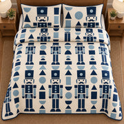 AI mockup, high overhead bedroom view of a nutcracker quilt with blue geometric nutcrackers and modular shapes and two matching printed pillow covers.