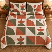 AI mockup, high overhead bedroom view of a mid century modern quilt with terracotta and olive geometric tile shapes with cream grid lines and two matching printed pillow covers.
