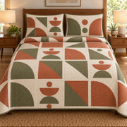 AI mockup, front bedroom view of a mid century modern quilt with terracotta and olive geometric tile shapes with cream grid lines and two matching printed pillow covers.