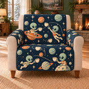 Alien Tea Cup Toss sofa cover on a beige armchair