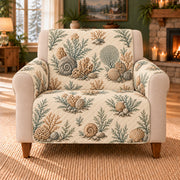 Ancient Reef Sprigs sofa cover on a beige armchair