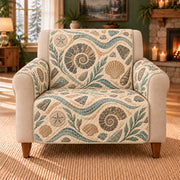 Ancient Shore Mosaic sofa cover on a beige armchair