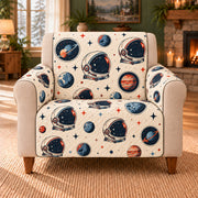 Astronaut Helmet Scatter sofa cover on a beige armchair