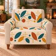 Atomic Leaf Meander sofa cover on a beige armchair