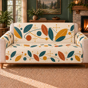 Atomic Leaf Meander sofa cover on a beige sofa