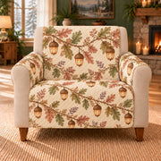 Autumn Acorn Lanterns sofa cover on a beige armchair