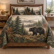 Black Bear Forest Nature quilt set displayed on a bed with coordinating pillow shams