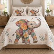 Boho Colorful Elephant Floral quilt set displayed on a bed with coordinating pillow shams