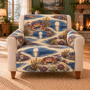 Cancer Tidepool Rhythm sofa cover on a beige armchair
