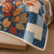Cream binding and diamond stitching detail on blue Cavalier autumn patchwork quilt
