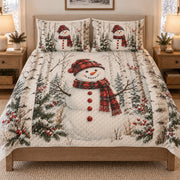 Christmas Snowman Birch Forest quilt set displayed on a bed with coordinating pillow shams