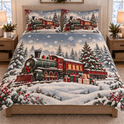 Christmas Train Snowy Forest quilt set displayed on a bed with coordinating pillow shams
