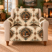 Clockwork Book Rosettes sofa cover on a beige armchair