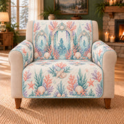Coral Palace Arches sofa cover on a beige armchair