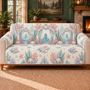 Coral Palace Arches sofa cover on a beige sofa